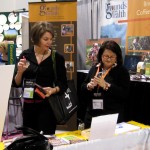 Volunteer Sylvia working the booth Volunteer Sylvia working the booth